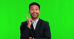 Asian businessman, thinking and idea on green screen for solution or remember against a studio background. Portrait of thoughtful man in surprise, memory or reminder for good plan or result on mockup