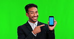 Phone, business man pointing and green screen, mockup and tracking markers for online advertising or presentation. Happy face of asian person for mobile space on ui or ux design on studio background