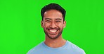 Happy, smile and man in a studio with green screen with a casual, trendy and cool tshirt outfit. Happiness, excited and portrait of a young male model with a positive mindset by chroma key background
