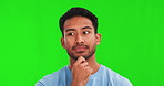 Thinking, ideas and man face on green screen, brainstorming emoji and confused, inspiration or problem solving. Casual, tshirt and asian person for memory, remember or solution on a studio background