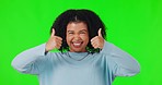 Woman, face and happy, thumbs up and green screen, hand gesture emoji and agreement on studio background. Excited, female person and like sign, yes and positive feedback with portrait and support