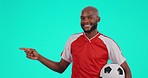 Black man, soccer and pointing on mockup for checklist, presentation or info against a studio background. Portrait of African male person or sports player show step, menu or information for game plan