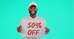 Black man, billboard and sign for discount sale, advertising or marketing on mockup against a studio background. Portrait of African male person with poster for deal, notification or pay half price