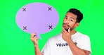 Speech bubble, thinking and man in a studio with green screen for marketing, promotion or advertising. Idea, brainstorming and male volunteer with board with mockup isolated by chroma key background.