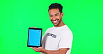 Green screen, pointing  and man with tablet mockup to volunteer, charity and community service app. Technology, social media and portrait of male person for ngo, nonprofit and donation advertising