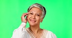 Beauty, face and senior woman in green screen studio for wellness, skincare and self love on mockup background. Portrait, glowing skin and elderly Indian lady model touching soft dermatology results