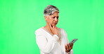 Phone, confused and senior woman on green screen in studio isolated on a background mockup. Mobile, elderly person and thinking, doubt or idea for social media app, communication and news on internet