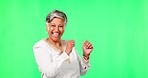 Dance, celebration and senior woman in green screen studio with good news, retirement and freedom on mockup background. Happy, dancing and elderly Indian female person winning, excited and having fun