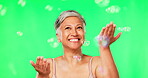 Old woman, bubbles and natural beauty, green screen with fun and playful, cosmetic care and skin on studio background. Happy female model, antiaging and freedom with glow, skincare and dermatology