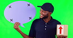 Speech bubble, mockup and a delivery black man on green screen in studio with a box for social media. Portrait, marketing or advertising and a male courier holding mockup with tracking markers