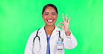 Okay sign, woman and doctor on green screen of healthcare success, support and excellence in services. Happy face of medical worker or clinic nurse in Mexico with yes or ok emoji on studio background
