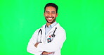 Asian man, doctor and arms crossed in confidence on green screen for healthcare advice against a studio background. Portrait of happy and confident male person or medical professional on mockup space