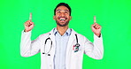 Pointing, happy and doctor with man on green screen for advertising, deal and idea. Healthcare, medical and medicine with portrait of person on studio background for presentation, review and news
