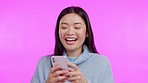 Asian woman, phone and texting with laugh in studio on social network app, meme and funny by background. Japanese student girl, smartphone and chat with smile, comic post and typing with reading blog