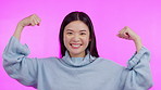 Portrait, asian woman flex her muscles and against a studio background for power. Motivation or strong, mockup space or celebration and happy female person pose for achievement or success in backdrop