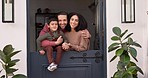 Happy, love and face of a family by the door for spending time and bonding by their modern home. Happiness, smile and portrait of parents standing with their cute young boy child by their house.