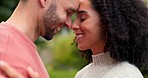 Forehead, nature and couple with love, smile and relationship with happiness, romantic and bonding. Romance, man and woman outdoor, dating and marriage with loving together, support and commitment