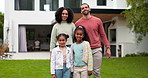 Mother, father and happy family portrait outdoor with a smile, love and care in a backyard. Young latino woman and man or parents and kids together in home garden for quality time, peace and fun