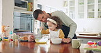 Father daughter and baking in kitchen for fun with learning at house with ingredients for food. Dad, cooking and girl with dessert for happiness at family home for childhood with bonding and mixing.