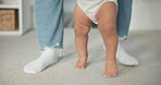 Legs, baby learning to walk with parents and growth, development and early childhood with motor skills. Family, support and first steps with trust, progress and balance with milestone and feet