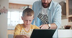 Tablet, education and a father helping his son with online homework or to study while learning in the kitchen. Tutor, education and a boy student distance learning or home schooling with a parent