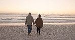 Walking, beach and senior couple holding hands by ocean for commitment, bonding and quality time at sunset. Marriage, travel and man and woman relax for romance on holiday, vacation and anniversary