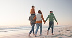 Happy, holding hands and travel with family at beach for relax, love and support. Vacation, sunset and bonding with parents and children walking on coastline for seaside holiday, journey and freedom