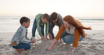 Family, building with sand and castle on the beach in the dirt or children, mom and dad playing together on holiday. Ocean, sandcastle and memory of childhood, vacation in summer with parents or kids