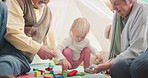 Building blocks, bonding and grandparents playing with their grandchild in her nursery at home. Playful, spending time and senior man and woman in retirement with a girl kid and toys in her bedroom.