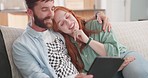 Young couple, tablet and laugh on sofa with social media app, funny video or comedy movie on internet. Man, woman and digital touchscreen with comic joke, crazy meme and happy in living room to relax