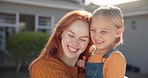 Happy, smile and mother hugging her child while standing, bonding and playing in their backyard. Happiness, love and young mom embracing her girl kid while enjoying fresh air in the garden at home.