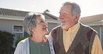 Love, old couple embrace in yard of new home with smile and hug in retirement with happy face. Senior man, woman and happiness in backyard together, property investment with pension and real estate.