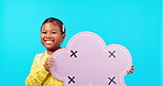 Happy little girl, speech bubble and mockup for social media or chat against a blue studio background. Portrait of female child or kid smile holding icon for feedback, comment or message on mock up