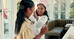 Happy, baking and mother dancing with her child in the kitchen while preparing a meal, supper or dinner. Happiness, dance and young mom cooking, teaching and bonding with her girl kid at their home.