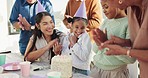 Celebration, family and girl with cake for birthday, celebration and party event outdoors for social gathering. Park, lunch and mother with children at picnic with desserts, presents and clapping