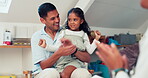 Healthcare, high five and a pediatrician talking to a girl with her dad in the bedroom of a home during a visit. Medical, kids and applause with a child doctor in an appointment with a family