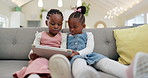 Black girl children, tablet on sofa and online with elearning or watching cartoon movie, sisters at home and screen time. Young female kids, streaming and subscription to education app or film