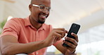 Hands, typing and a black man with a phone on the sofa for social media, connection or communication. Smile, relax and an African person with a mobile for an app, email or notification in a house