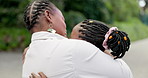 Black woman, hug and daughter with love at park for bonding or happy family in childhood for affection. Girl, embracing and mother in forest with smile or care together with trees for happiness.