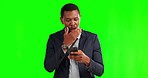 Green screen, business and black man with a smartphone, shocked and internet error on a studio background. Male person, model or employee with a cellphone, bad news or glitch with social media gossip