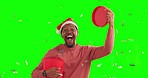 Happy man, Christmas gift and confetti on green screen in surprise for festive holiday or celebration. Portrait of African male person winning, present or box for party against a studio background