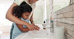 Help, woman and kid washing hands in bathroom, teaching hygiene and health with safety routine. Water, soap and hand wash, mother and daughter learning skin care, cleaning dirt and germs for wellness