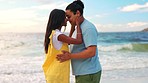 Hug, holiday and couple with love, beach and quality time with sunset, relationship and romantic gesture. Romance, man or happy woman embrace, seaside and dating with commitment, loving and happiness