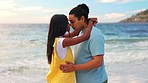 Happy, hug and couple with love, beach and tropical island  for vacation, romantic gesture or quality time. Romance, man or woman embrace, seaside holiday or dating with commitment, loving or bonding