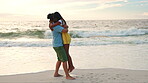 Ocean, love and indian couple with hug on vacation for romantic getaway on weekend. Couple, embracing and beach with sunset or bonding in summer on holiday for quality time in outdoor for travel.