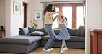 Dance, love and mother with daughter in home for bonding, quality time and loving relationship. Family, happy parents and mom with girl in living room for dancing, learning and teaching move together