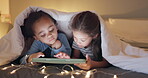 Tablet, night and children streaming a movie, cartoon or show in bedroom, tent or playing a game together in bed. Friends, girls or kids typing on mobile app for online video, movies or internet