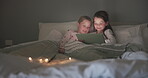 Tablet, night and streaming with children in bedroom for storytelling, digital and watching movies. Happy, internet and technology with kids relax in family home for subscription, online and media