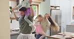 Home, dance and family with love, energy and wellness with freedom, kitchen and playful together. Parents, happy mother and father with children, kids and dancing with joy, apartment and performance
