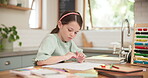 Girl, counting and homework with writing on kitchen table for maths with knowledge or abacus. Learning, kid and school activity with study at house for childhood development in notebook or pencil.